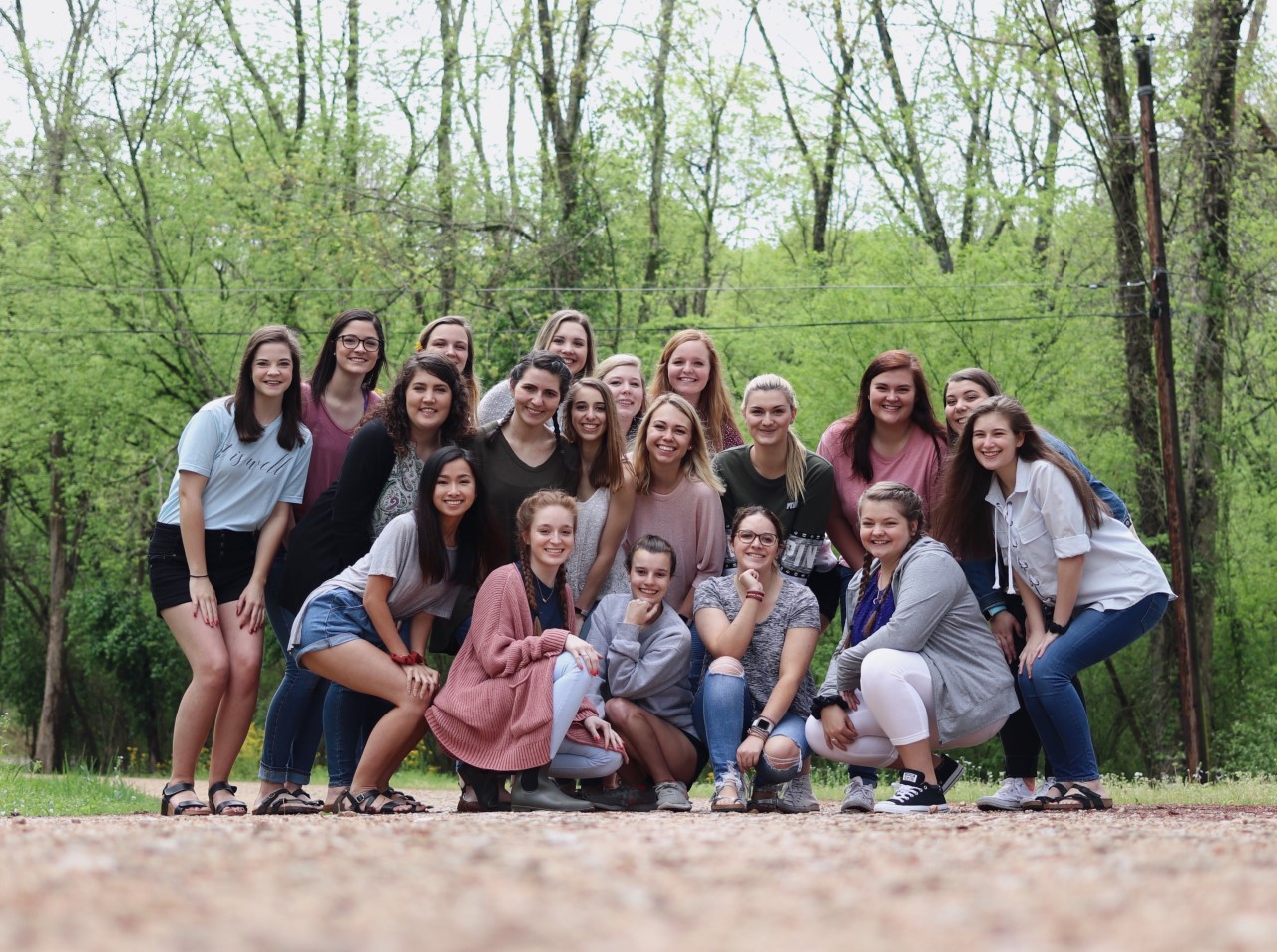 Members of Alpha Delta Chi pose at the park